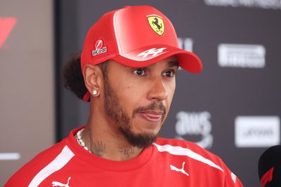 Ferrari fined after Lewis Hamilton knocks over mechanic during pit stop