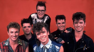 “We’re in the middle of a gig at the Palladium in Los Angeles, there’s 4000 people there, and this bloke is walking around on the stage as we’re playing. I’m like, ‘What the hell is going on?’”: How INXS got their big break in the ’80s