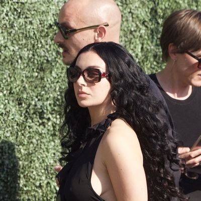 Charli XCX Delivers a Masterclass in How to Style a Little Black Wedding Guest Dress