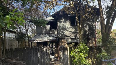 Woman dies from injuries after escaping apartment fire