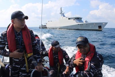 Survivors found clinging to fish trap three days after boat sinks in Indonesia
