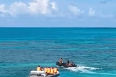 Philippines condemns Chinese coast guard for injuring Filipino sailor in disputed shoal