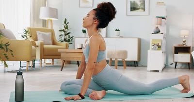 A yoga instructor says these are the four poses you should be doing to open your tight hips and build hip strength as you age