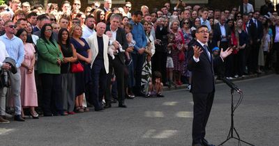 Andy Burnham's first PM speech greeted by man singing EU anthem and Rosebank protests