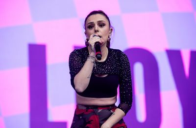 Cher Lloyd hints marriage is over