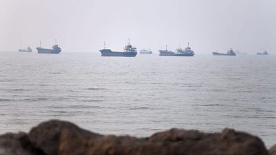 Tanker attacked in Strait of Hormuz as US strikes Iran for tenth consecutive night