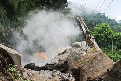 Race to reach trapped workers after 10 killed in tunnel collapse caused by methane explosion in India