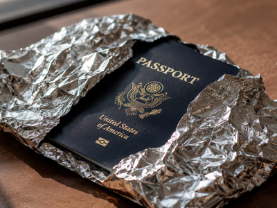 Why putting aluminum foil around an electronic passport can stop its chip from being read while closed