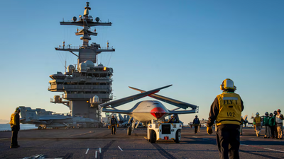 US Navy plans for 'Air Wing of the Future' with next-generation, pilotless carrier-based 1,150-mile-range drones to fly alongside manned aircraft