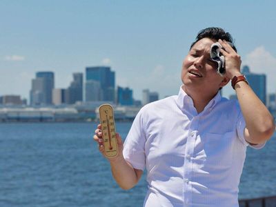 Japan cities 'cruelly hot' for first time