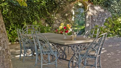 8 Paris-Inspired Courtyard Ideas That Will Make Your Backyard Feel Effortlessly Chic