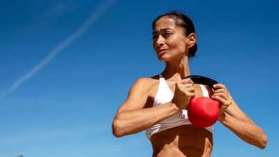 Forget sit-ups — according to a personal trainer, these 5 kettlebell exercises are the secret to building core strength and definition at any age