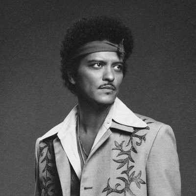 Quote of the day by Bruno Mars: 'You can't knock on opportunity's door and not be...' - motivational quote by Grammy-winning singer of Just the Way You Are, Uptown Funk and Die With a Smile teaches life lessons about preparation and taking action when you get an opportunity
