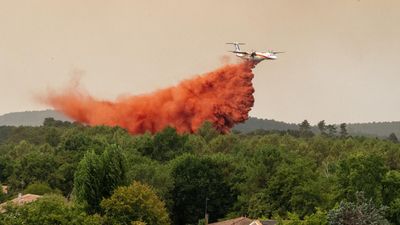 Wildfires force more than 200,000 people in France and Spain to flee