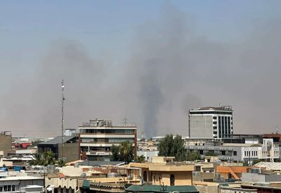 Explosions are heard near a US base in northern Iraq as US-Iran fighting escalates