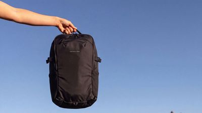 This travel backpack weighs less than half as much as a 15-inch MacBook Air – but it can still carry one