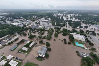 At least three dead and hundreds rescued after catastrophic flooding pounded Texas