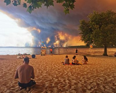 France and Spain race to control wildfires as more than 250,000 evacuated – as it happened