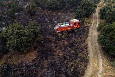 Photos show scale of devastation caused by unprecedented wildfires in France and Spain