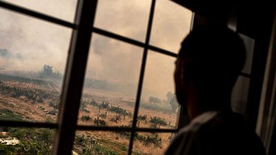 Red sun, orange sky as Madrid battles worst wildfire in its history
