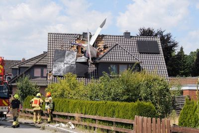 Small plane crashes into a home in northern Germany, leaving 1 dead and 1 missing
