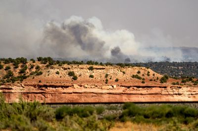 Firefighter becomes fourth to die in blaze near Colorado-Utah border as wildfires continue to burn