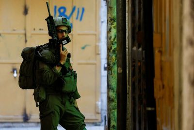 Israeli settlers set fire to West Bank mosques after deadly clash