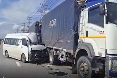 15 passengers injured when van hits parked truck