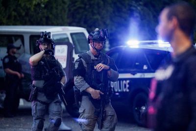 Seattle shooting: Three dead and suspect in custody after killing at food festival