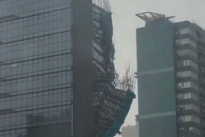 Scaffolding collapses from high-rise building as Typhoon Noul looms over Hong Kong