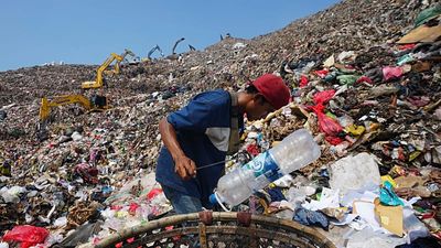 Waste pickers work at Indonesia's largest landfill
