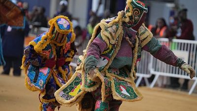 Masked performers fill Porto-Novo streets in Benin festival