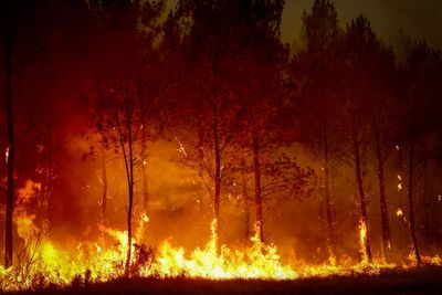 Huge wildfires rage in France and Spain as firefighters race against time before next 40C heatwave