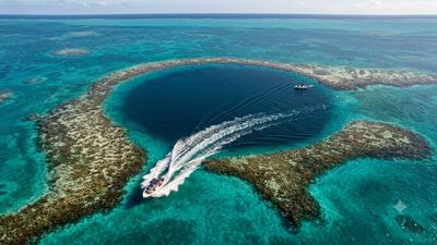 Divers once believed the Great Blue Hole was bottomless; then explorers discovered human remains deep inside