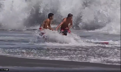 Terrifying Santa Cruz beach rescue caught on camera after young swimmer is swallowed by powerful surf, witnesses left stunned