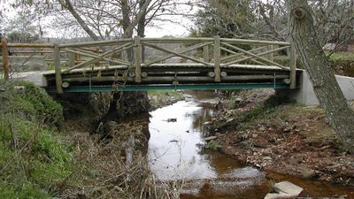 A tiny footbridge between Spain and Portugal crosses a border and a one-hour time-zone gap