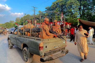 At least 30 killed as start of crucial election in Pakistan-administered Kashmir marred by violence
