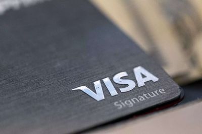 Visa to lay off 7% of staff as efficiency push deepens