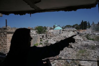 Residents return to a southern Lebanese village after a U.S.-brokered agreement, in photos