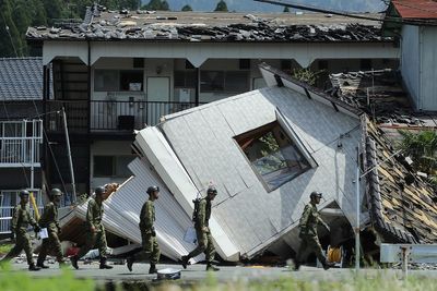 At least 13 killed in major Japan earthquake as rescuers ‘race against time’ to find survivors