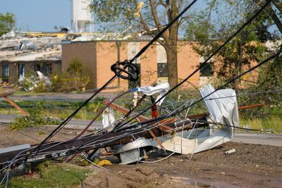 Twisted trees, crushed cars and shattered homes in Wisconsin, in photos