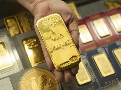 Gold edges lower ahead of Fed decision on interest rates