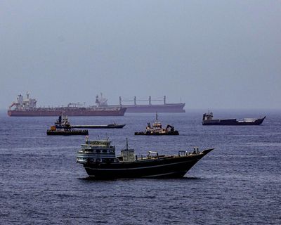 Ships stuck in strait of Hormuz pose ‘super-spreader’ biodiversity threat, scientists warn