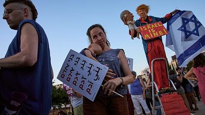 Israeli protesters march in Tel Aviv against West Bank settler violence