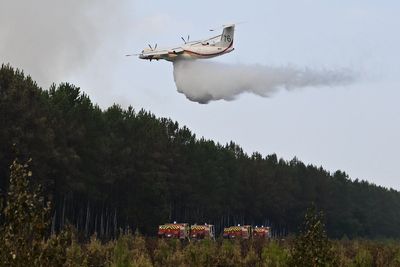 French heatwave to peak as raging wildfires force thousands to evacuate