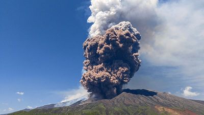 Drone footage shows Mount Etna cable car above volcanic landscape