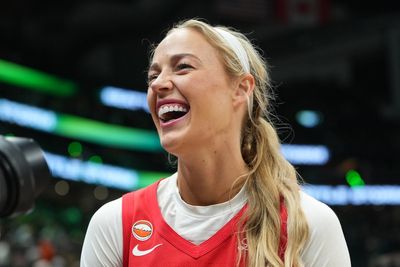 Dozens rally outside WNBA arena to back Sophie Cunningham’s transgender sports stance