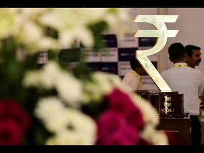 Rupee firms, volatility expectations tick up heading into Fed decision