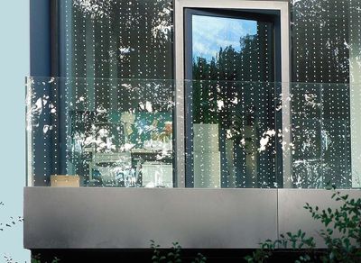 In Chicago, workers covered a deadly glass building with tiny white dots, and bird collisions dropped by about 95%