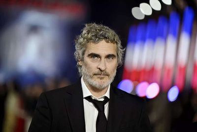 Quote of the day by Joaquin Phoenix: 'When I look back I can’t believe how my parents managed, but the cliche is true. We didn’t have money, but we...' Life lessons from inspirational quote on family values, love, material wealth, parental sacrifice, true happiness and success